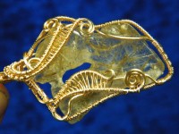 Rutilquarz Anhänger mit Spiralen-Fassung